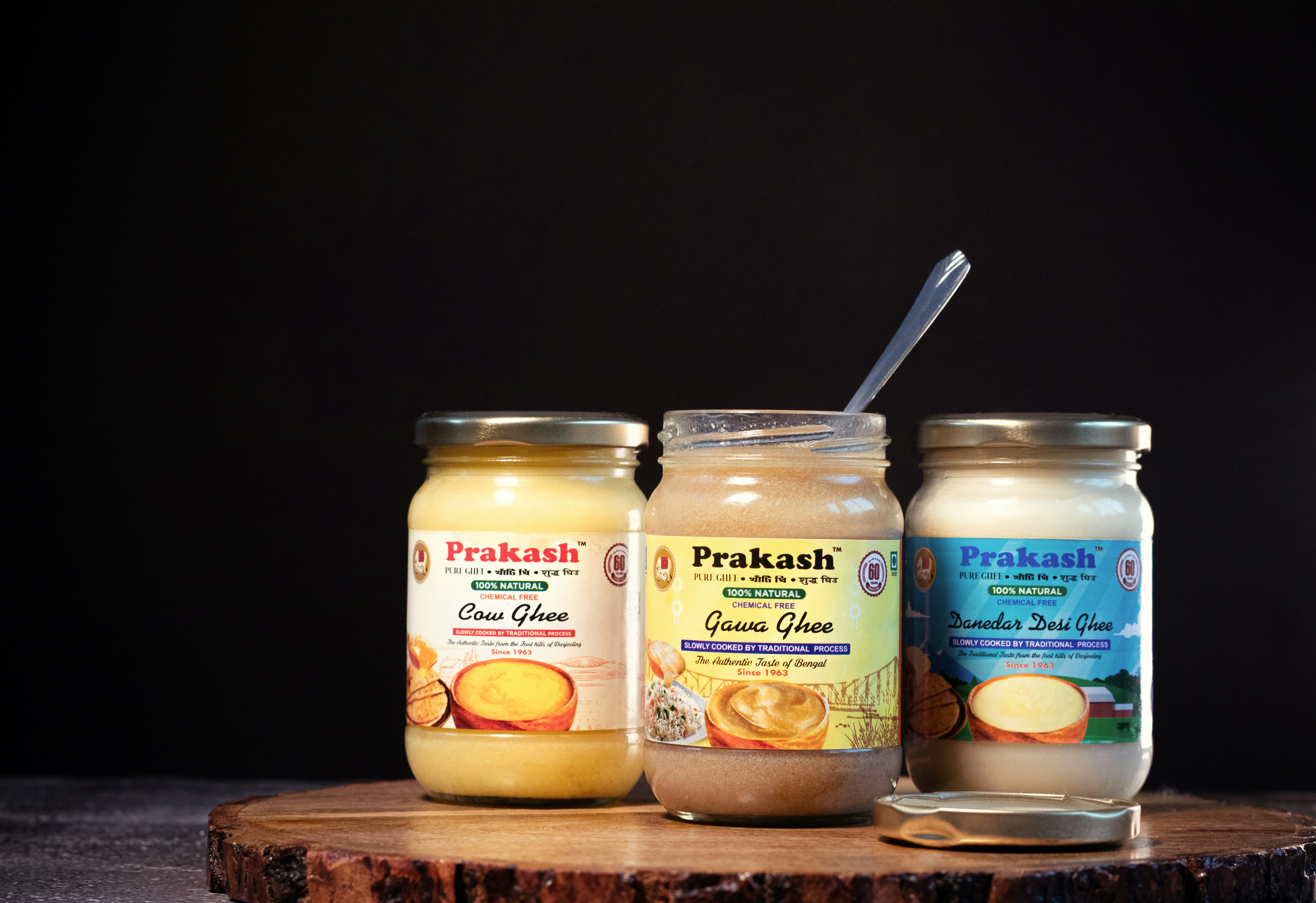 three jars of food sit on a table