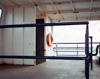 a boat with a life preserver on the deck