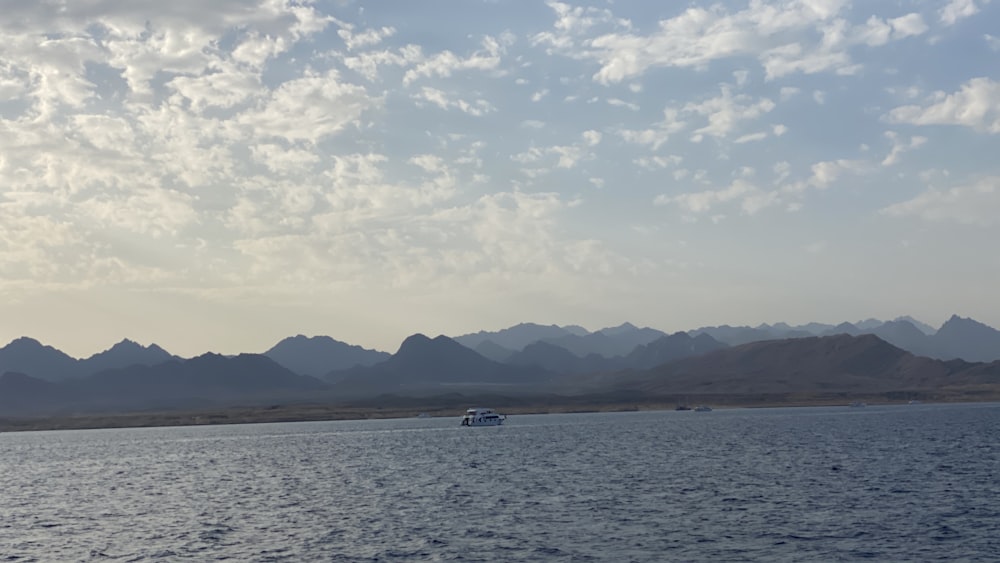 a large body of water surrounded by mountains