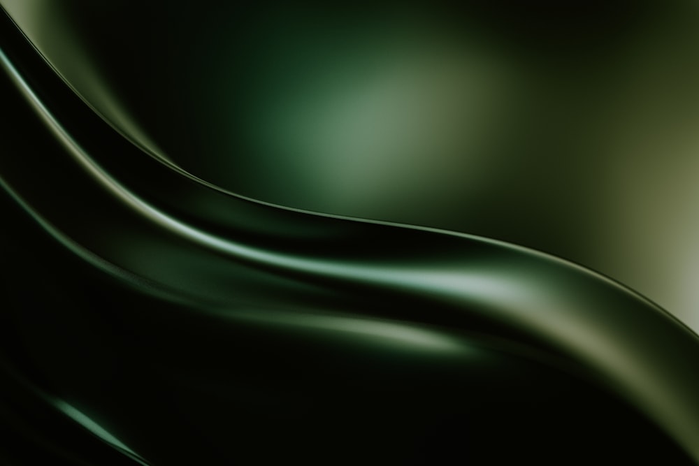 a black and green background with wavy lines