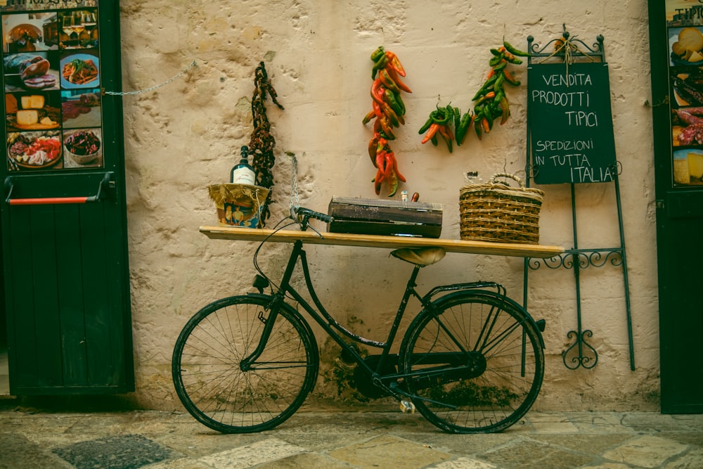 a bicycle parked in front of a store