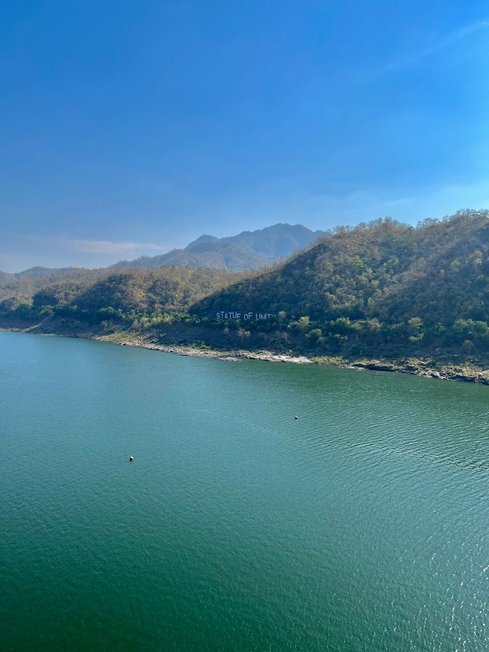 a large body of water surrounded by mountains