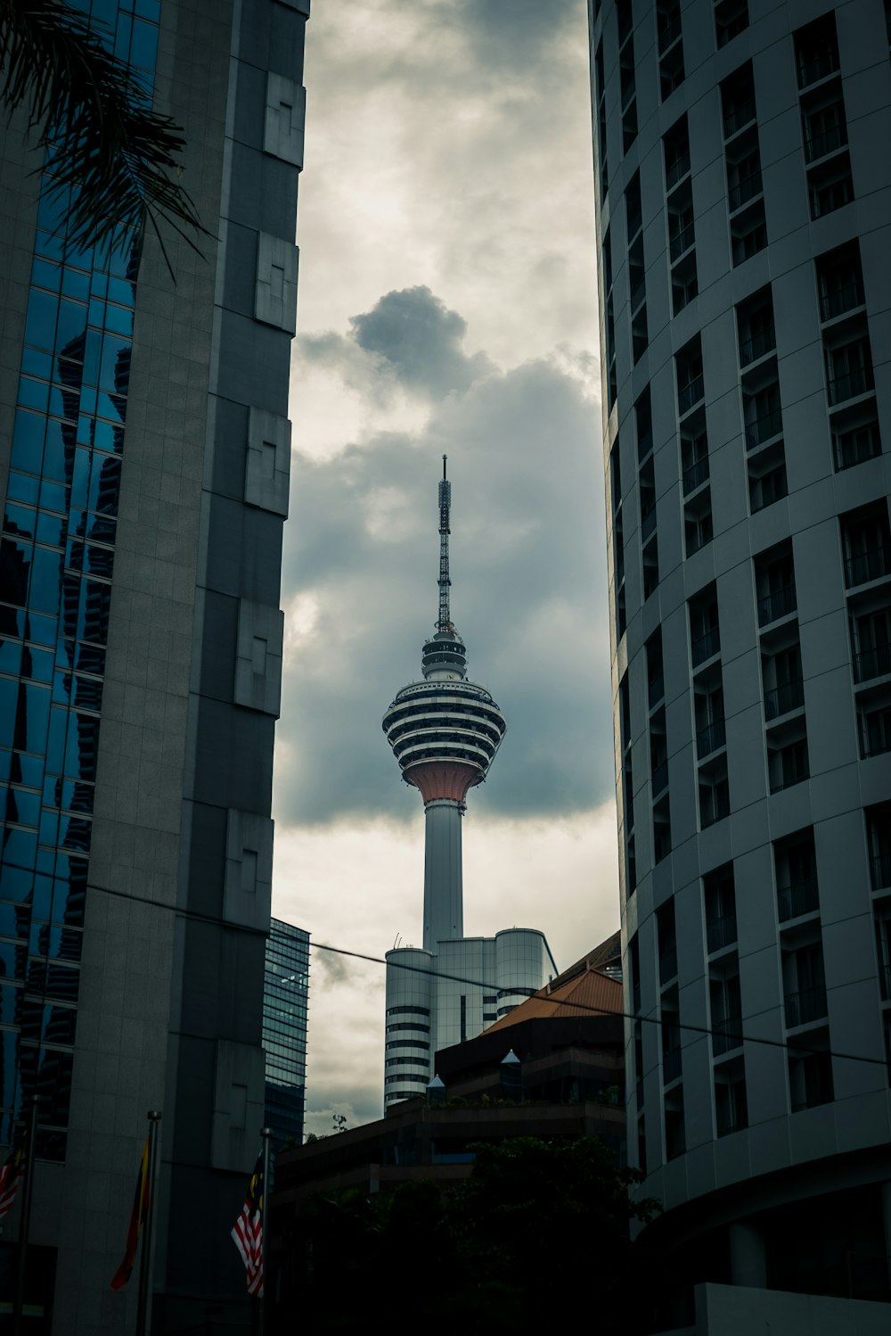 a very tall tower towering over a city