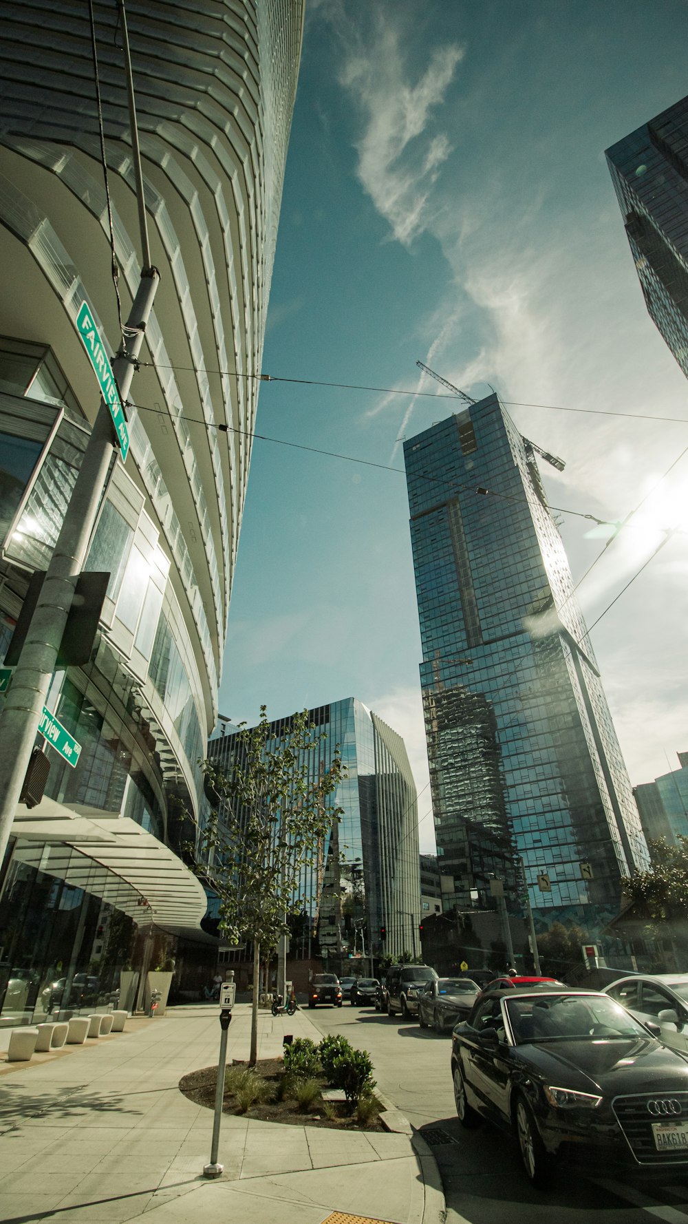 a city street filled with lots of tall buildings