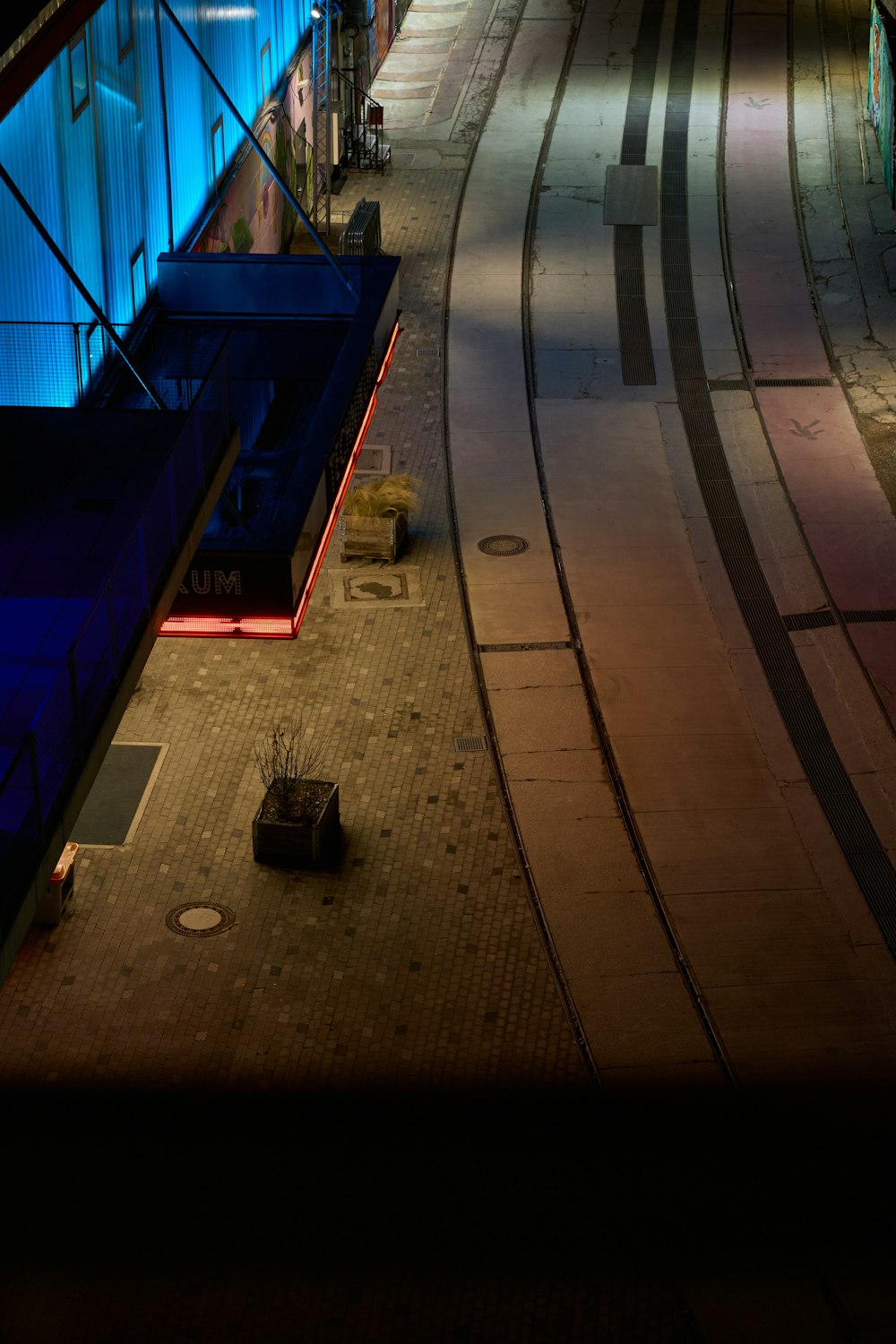 a train on a train track at night