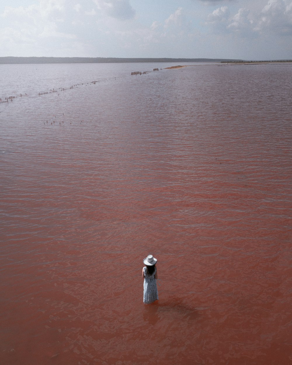 a large body of water with a white object in the middle of it