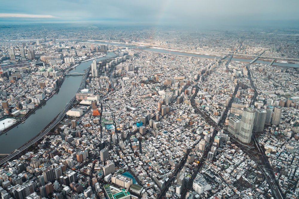 an aerial view of a city with a river running through it