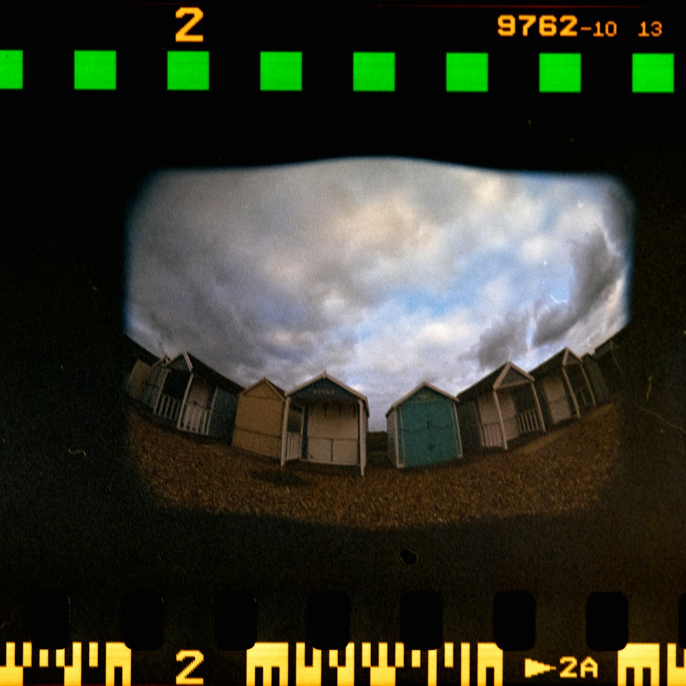 a view of a bunch of houses through a camera lens