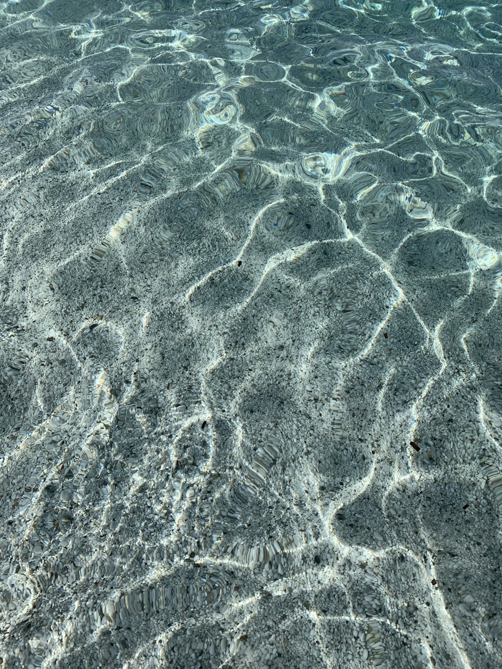 the water is crystal clear and blue