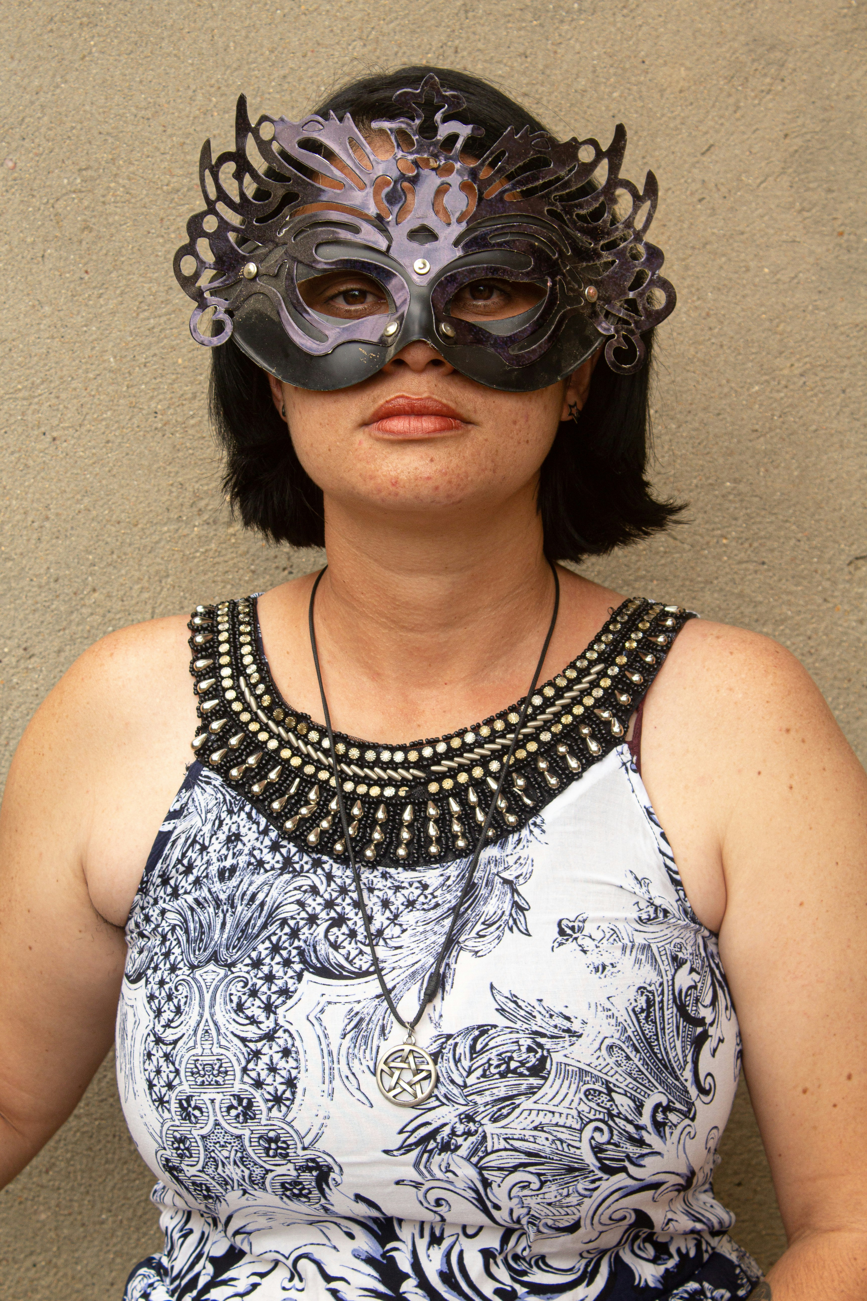 a woman with a mask on her face