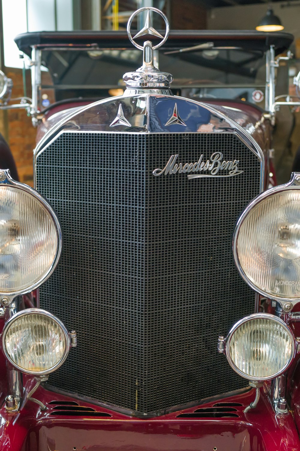 a close up of the front of a classic car