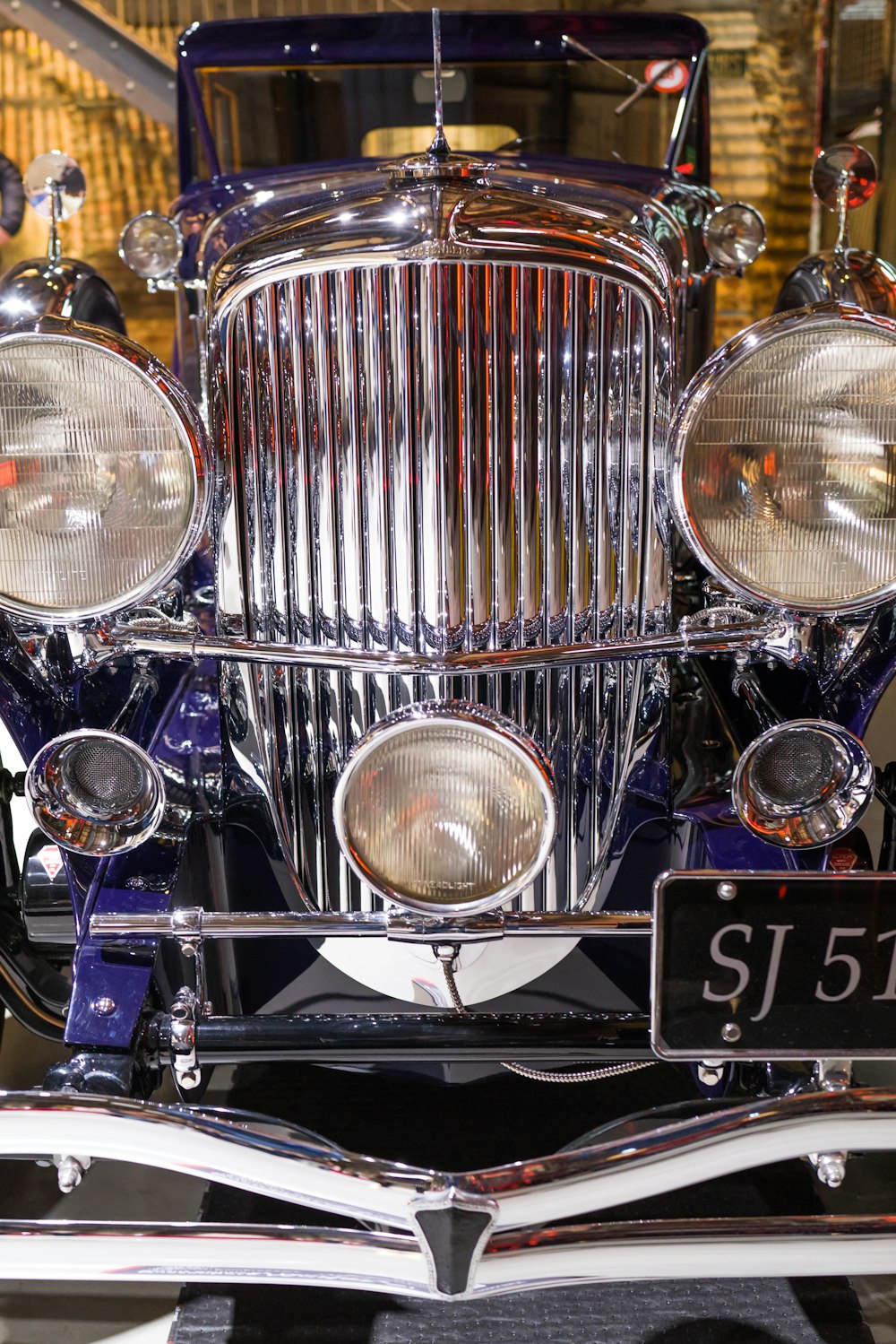 a close up of a classic car on display