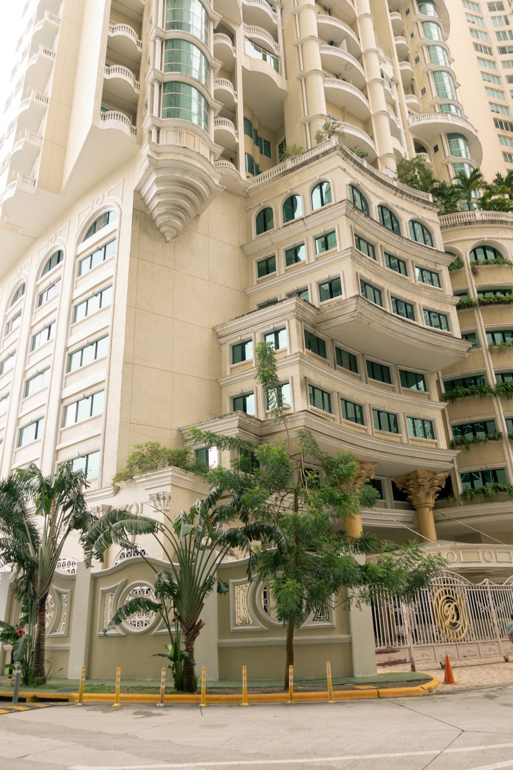 a tall building with balconies and balconies on the top of it