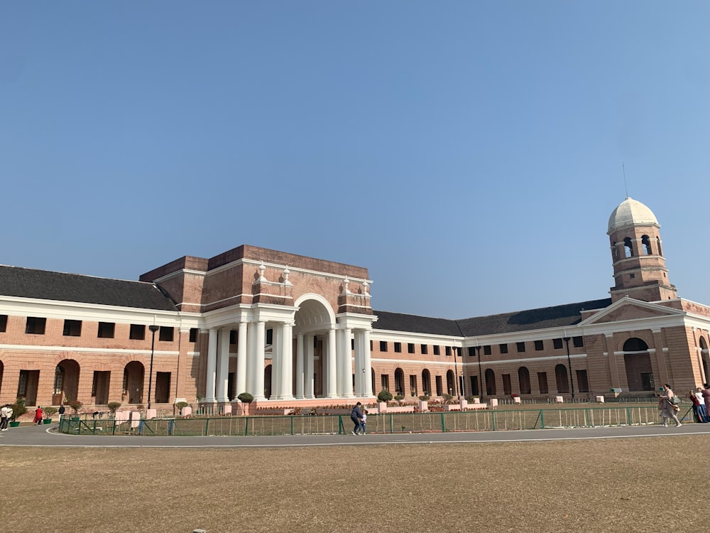 a large brick building with a clock tower