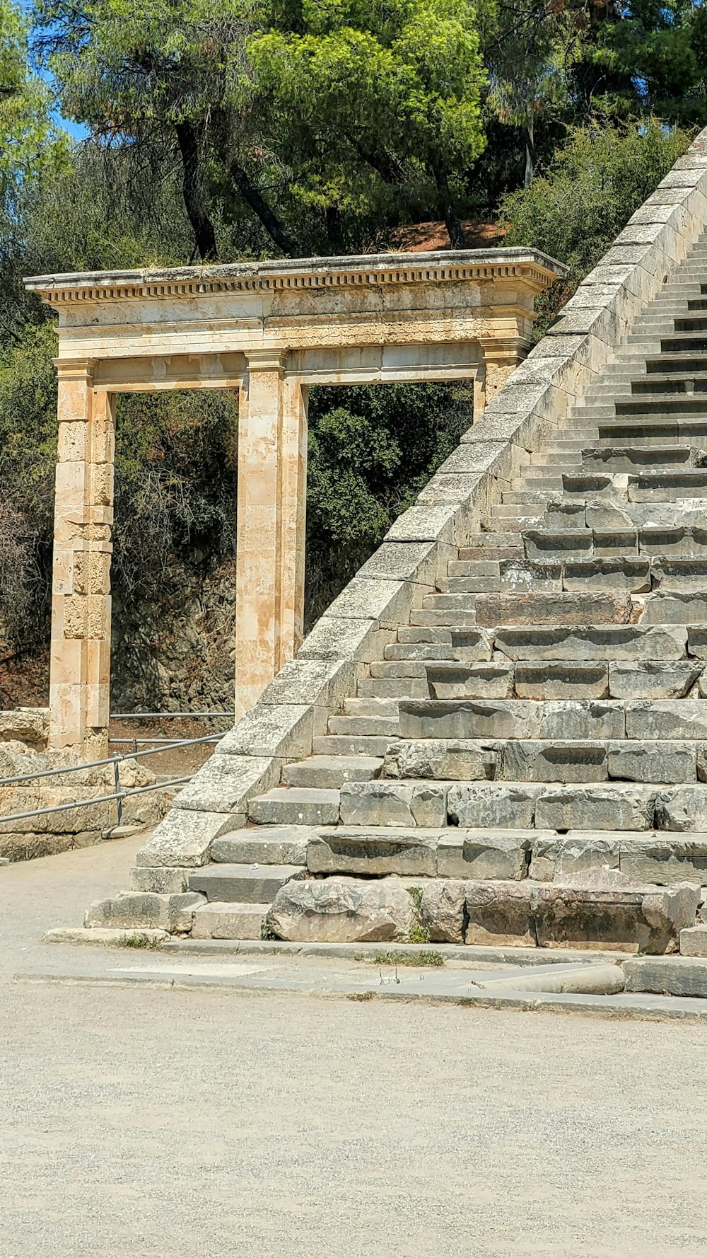 a stone structure with steps leading up to it