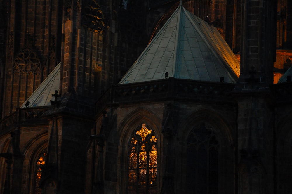 a large cathedral with a clock on the side of it