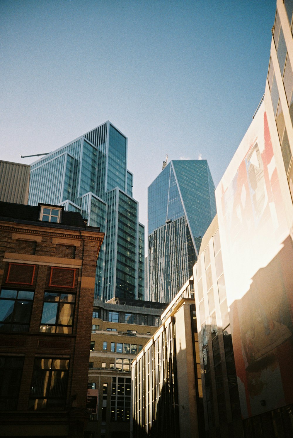 a group of tall buildings in a city