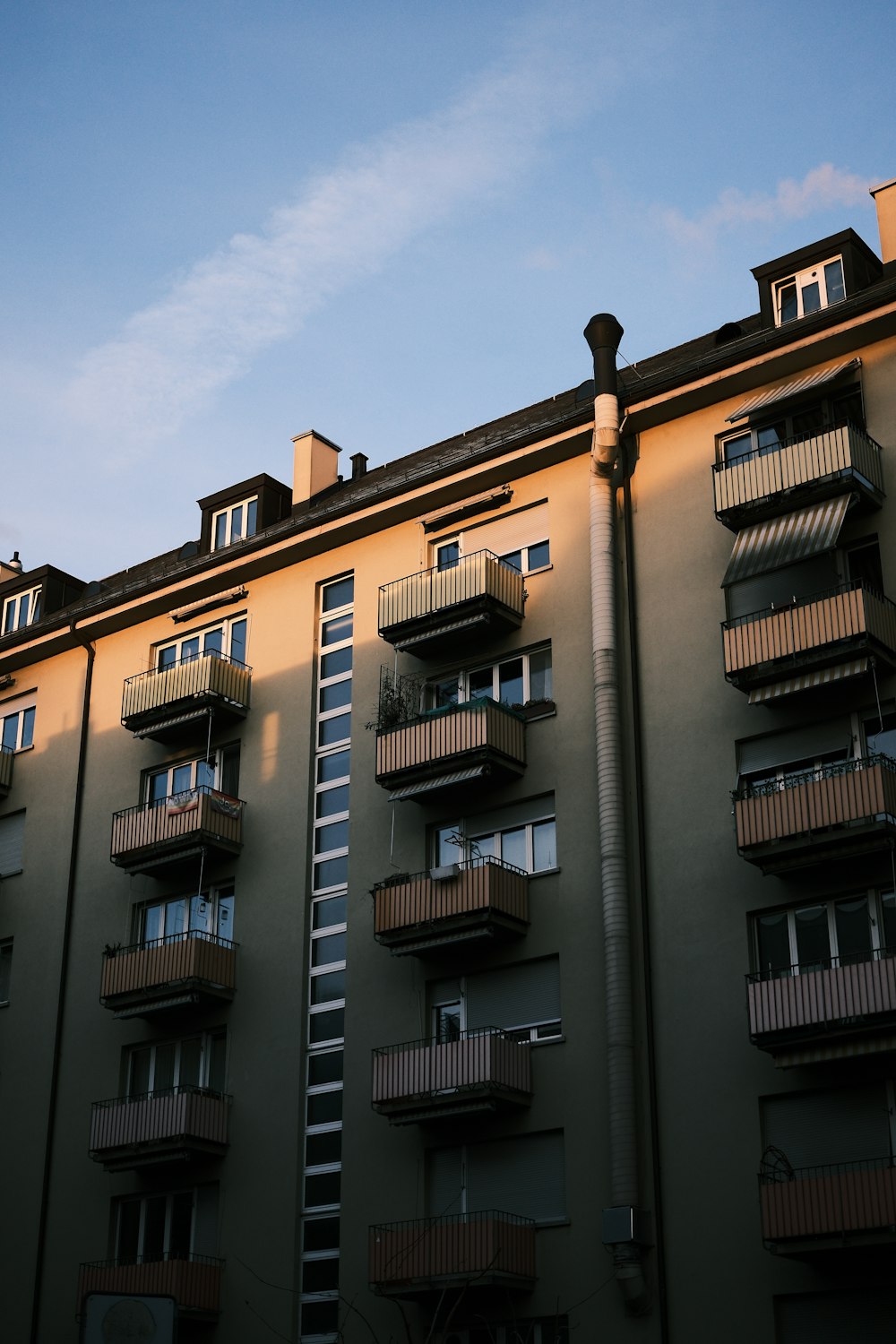 a tall building with balconies and balconies on the balconies