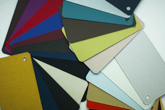 a pile of different colored tags on top of each other