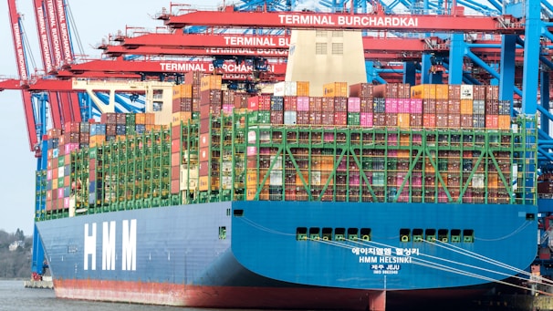 a large cargo ship is loaded with containers