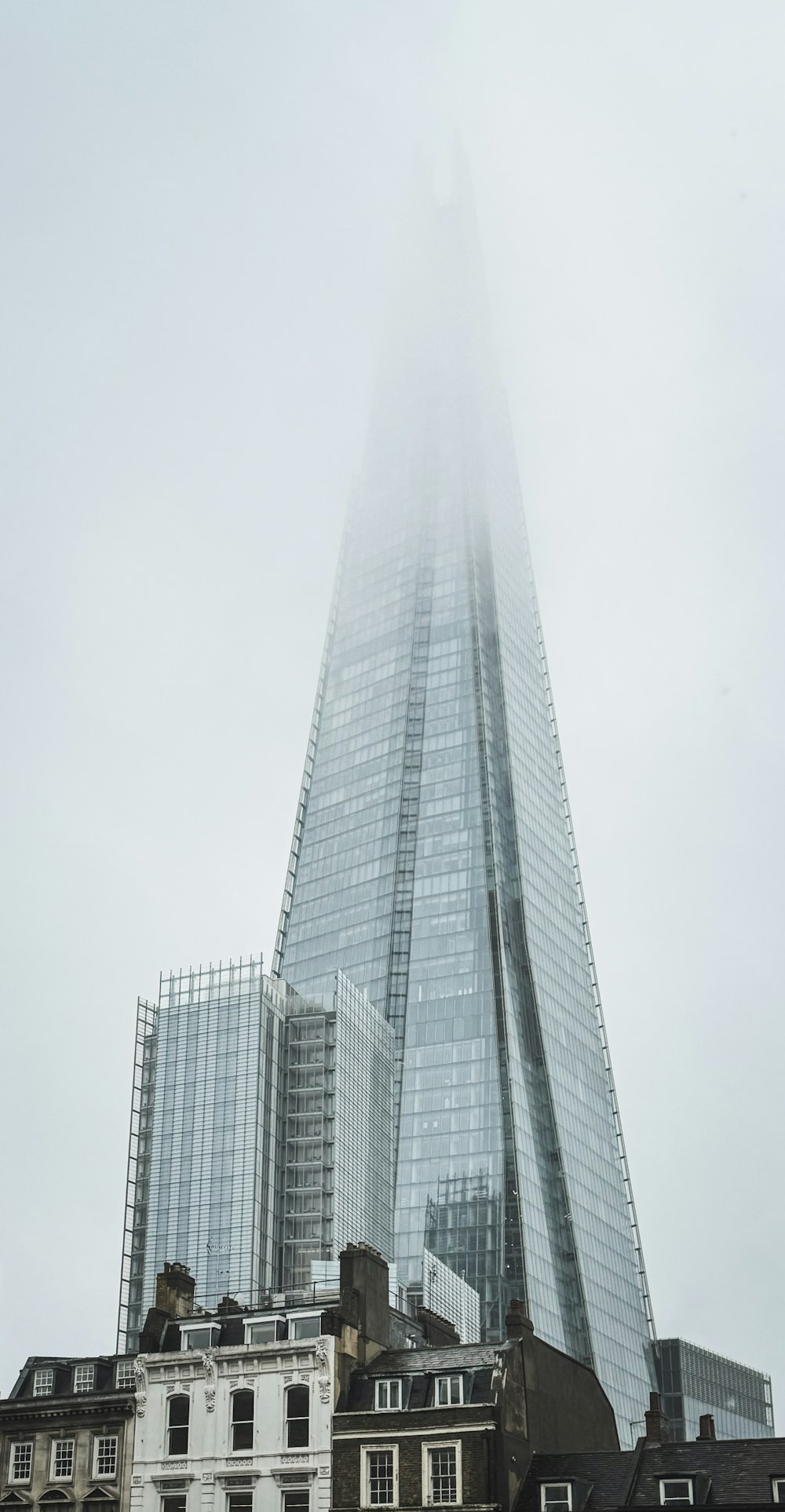 a very tall building with a very tall spire