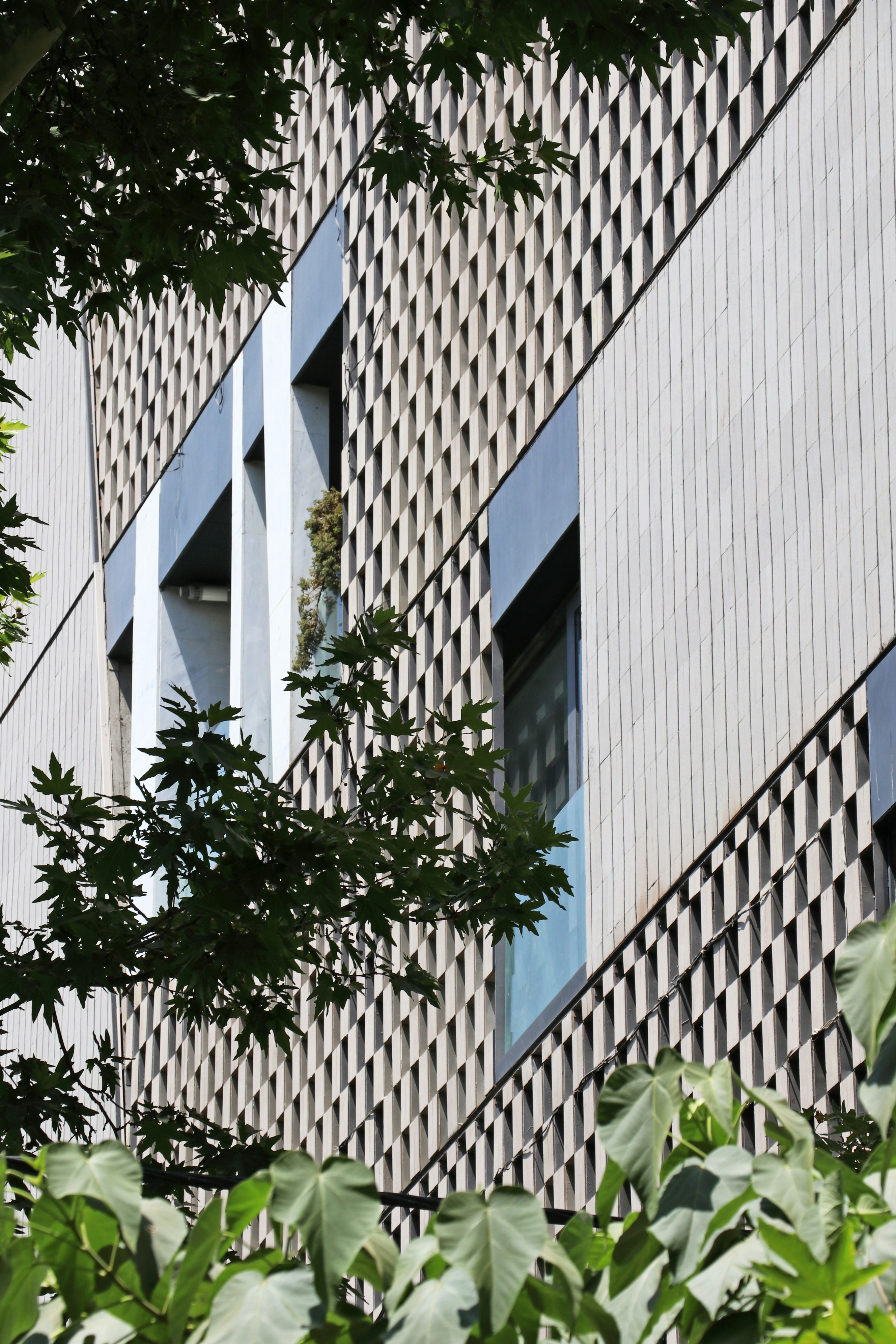 a tall building with a clock on the side of it