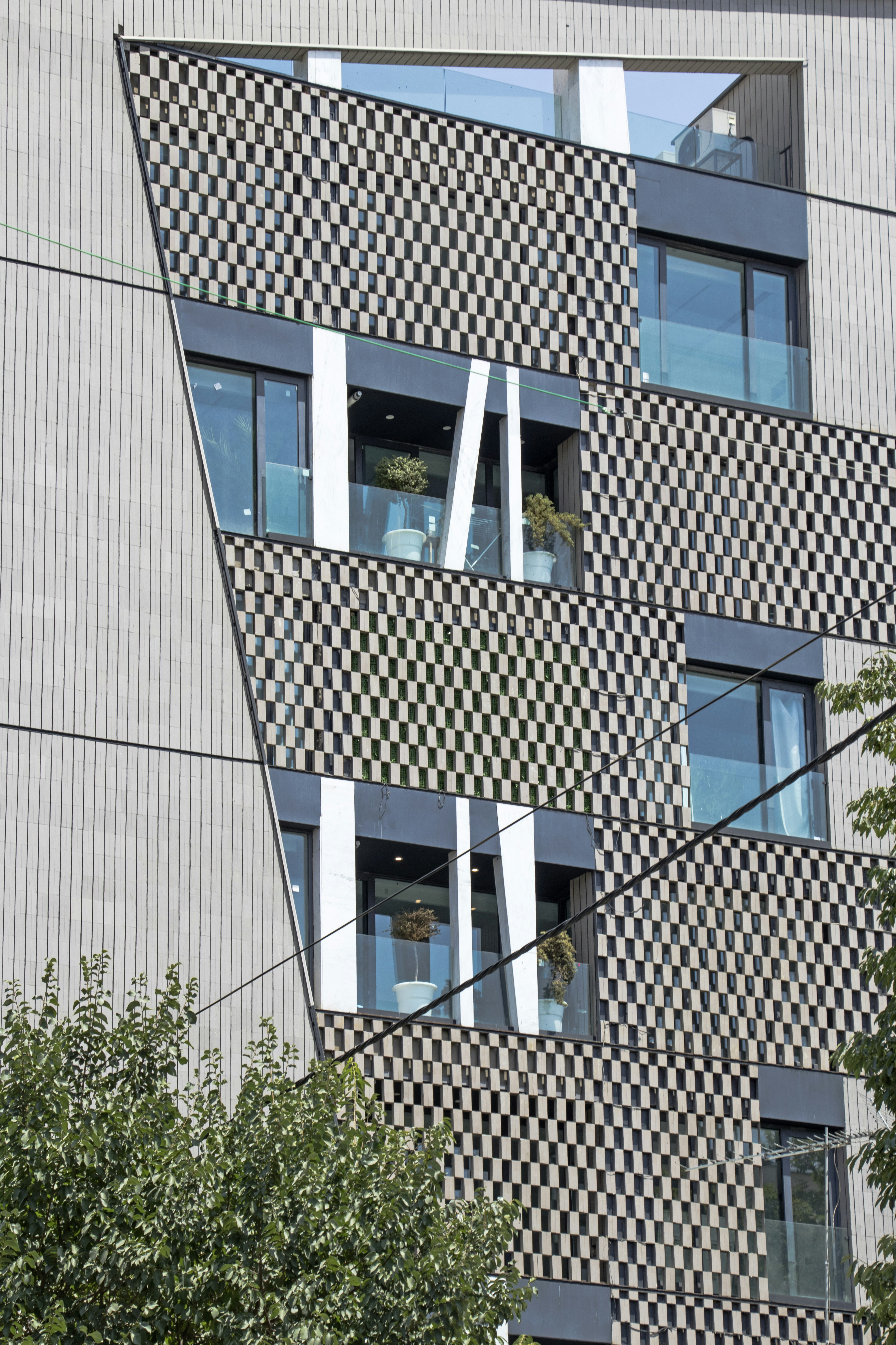 a tall building with a clock on the side of it