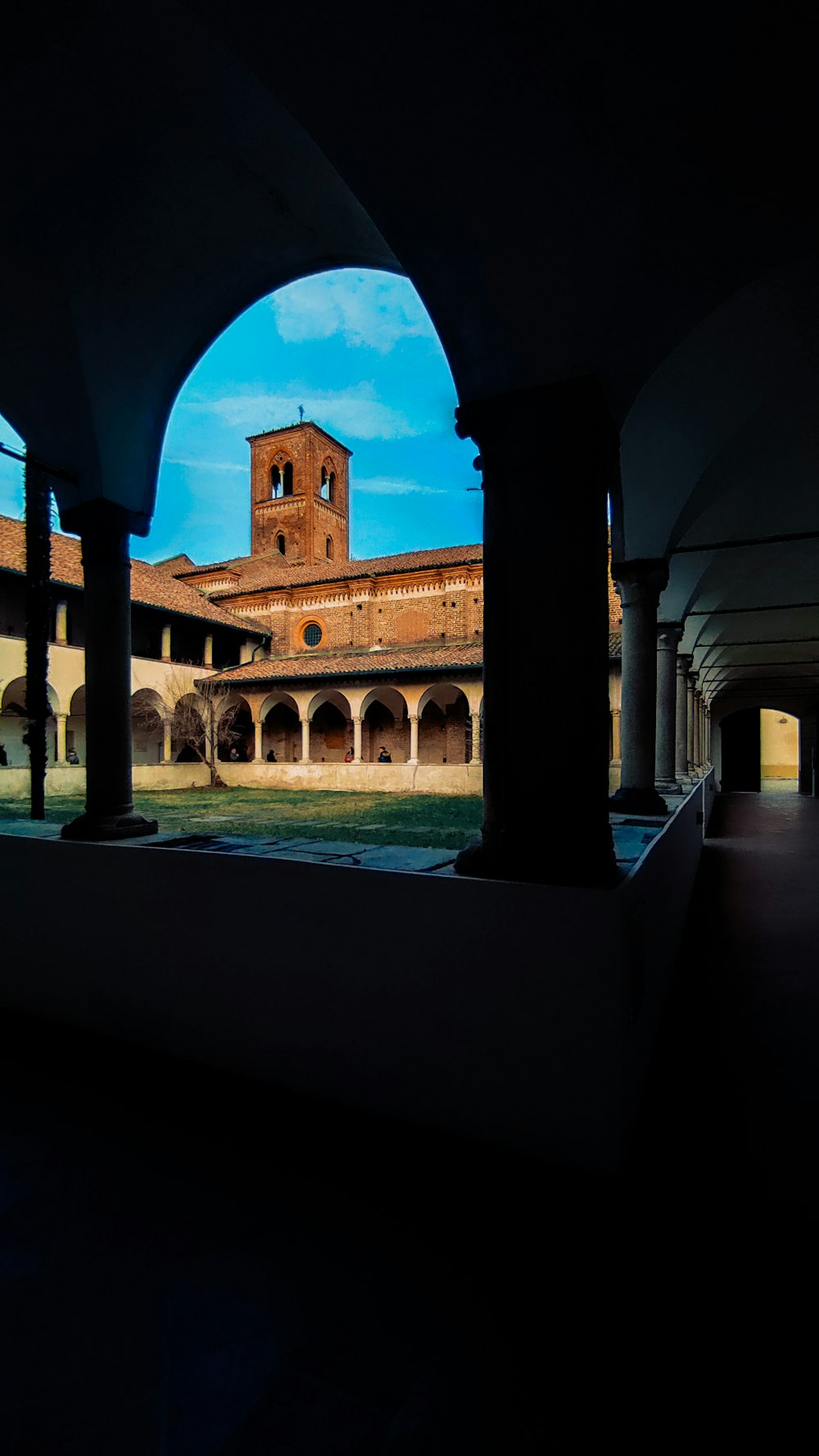 a view of a building through an archway