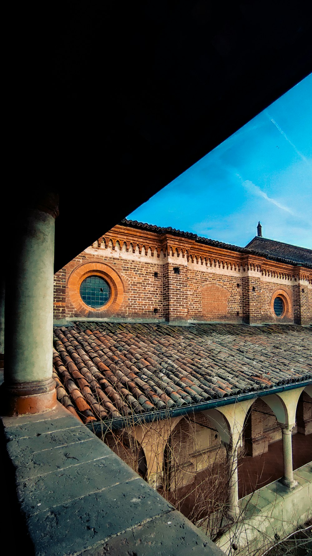 a view of a building from the roof of a building