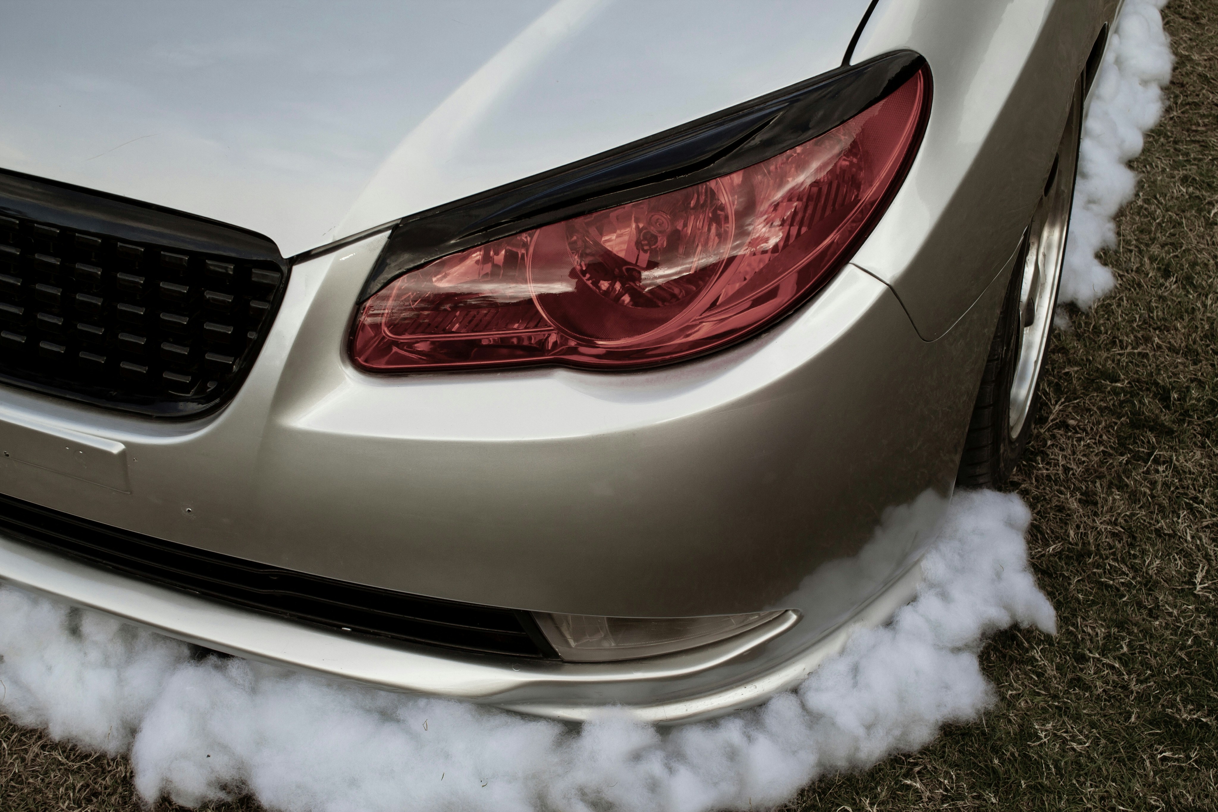 a car with a lot of smoke coming out of it
