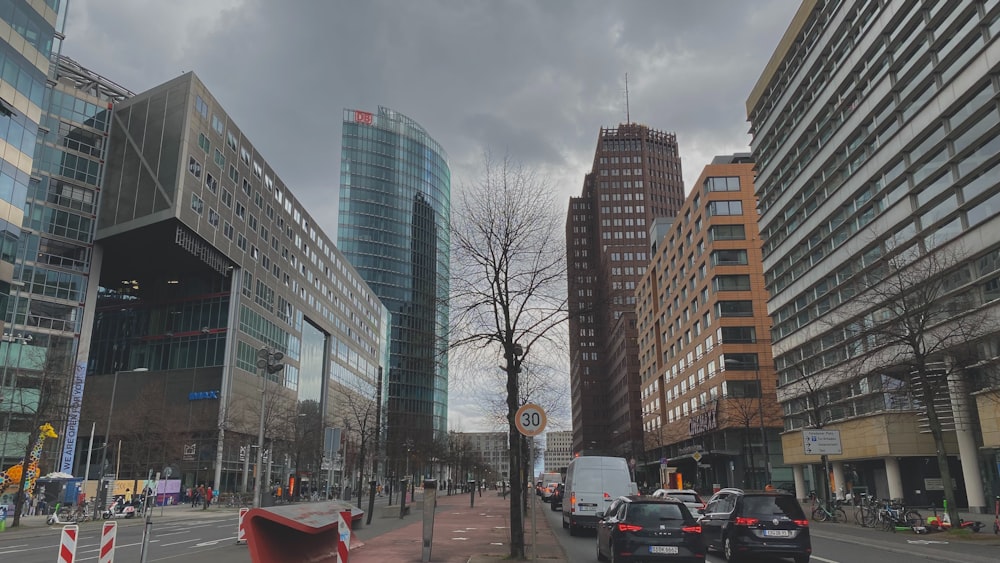 a city street filled with lots of tall buildings