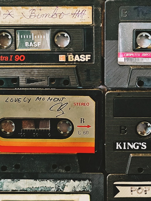 a pile of old cassettes sitting on top of each other