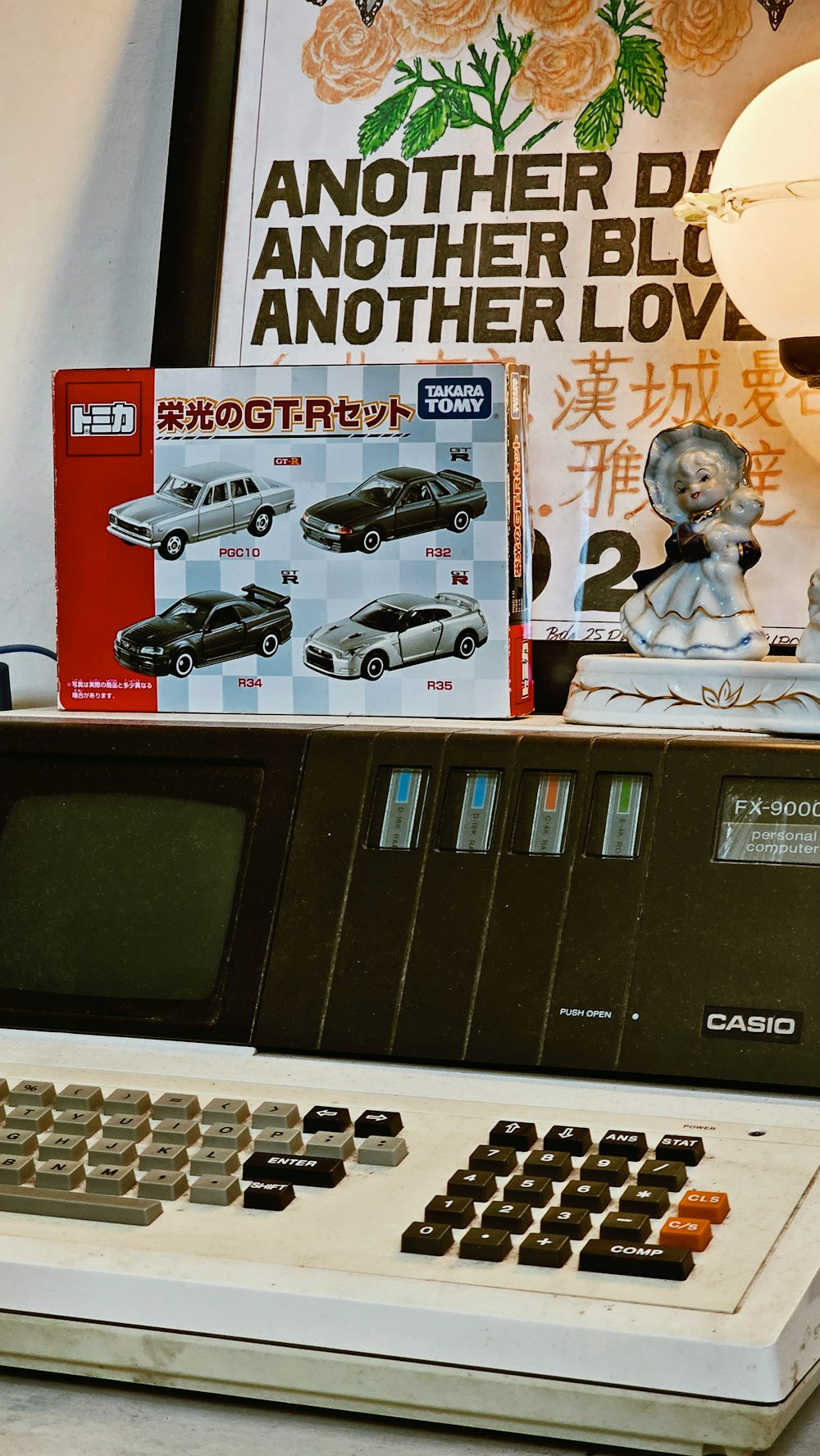 an old computer sitting on top of a table