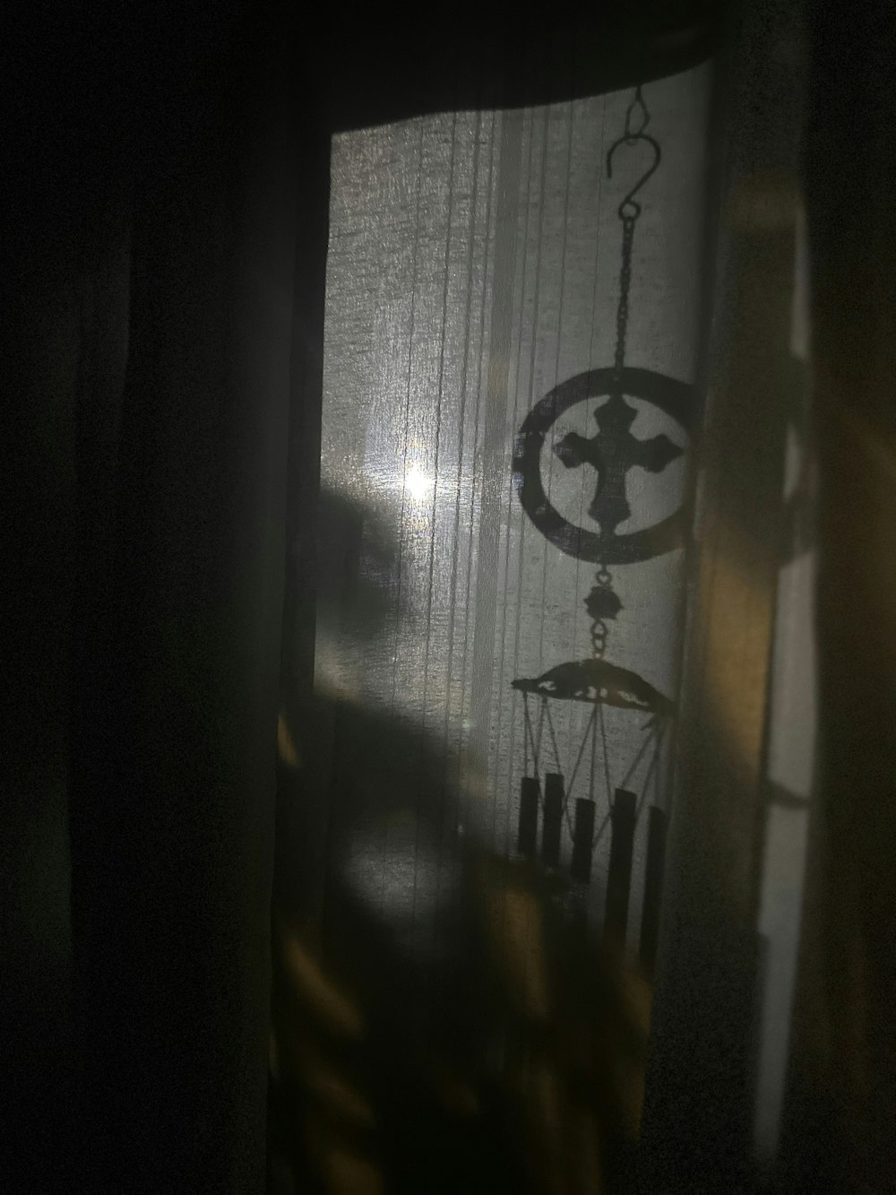 a picture of a window with a cross on it