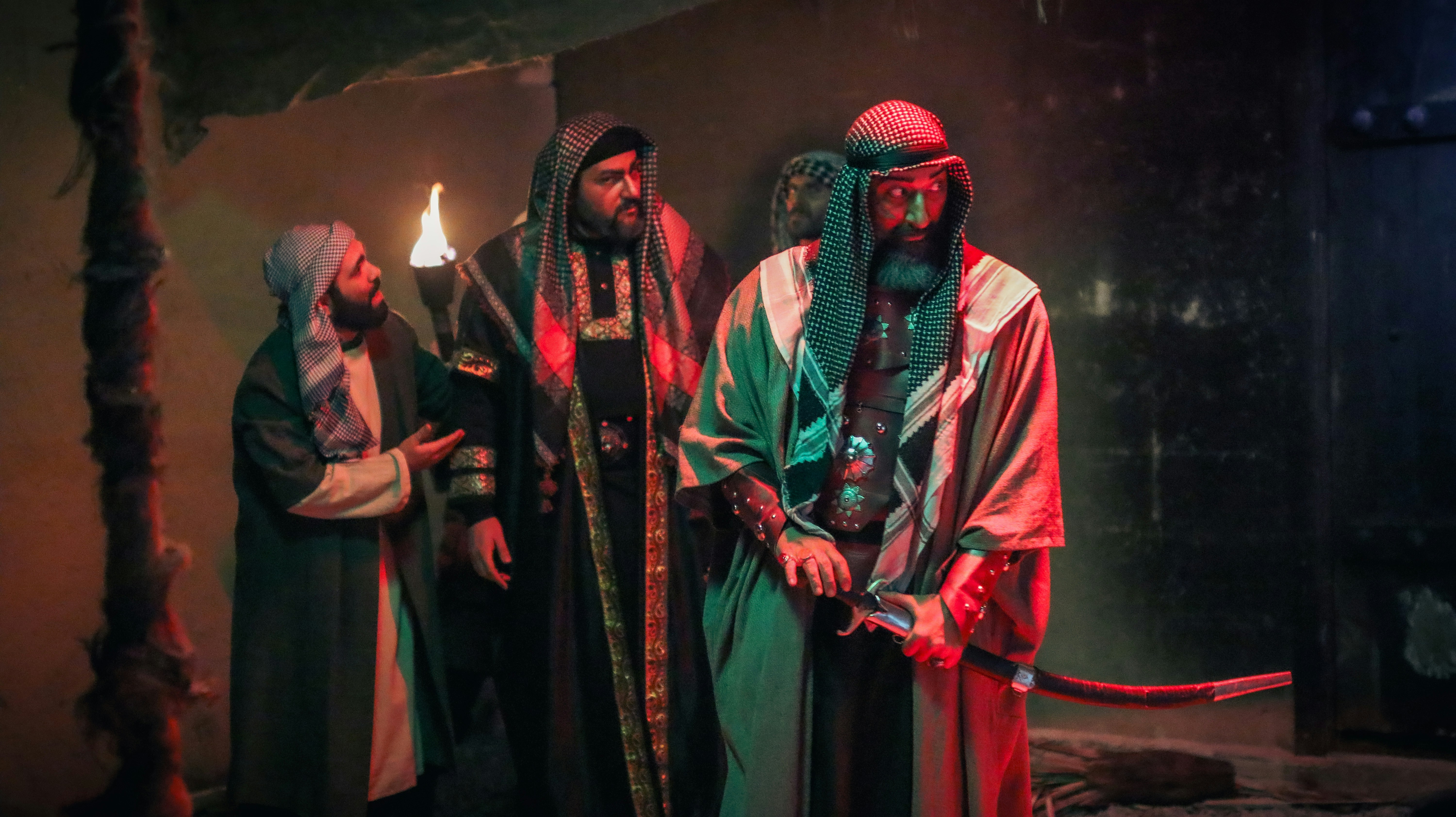 a group of men standing next to each other