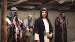 a group of men standing next to each other