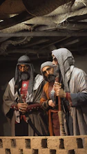a group of men standing next to each other