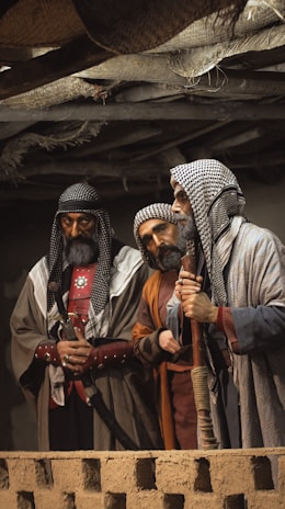 a group of men standing next to each other
