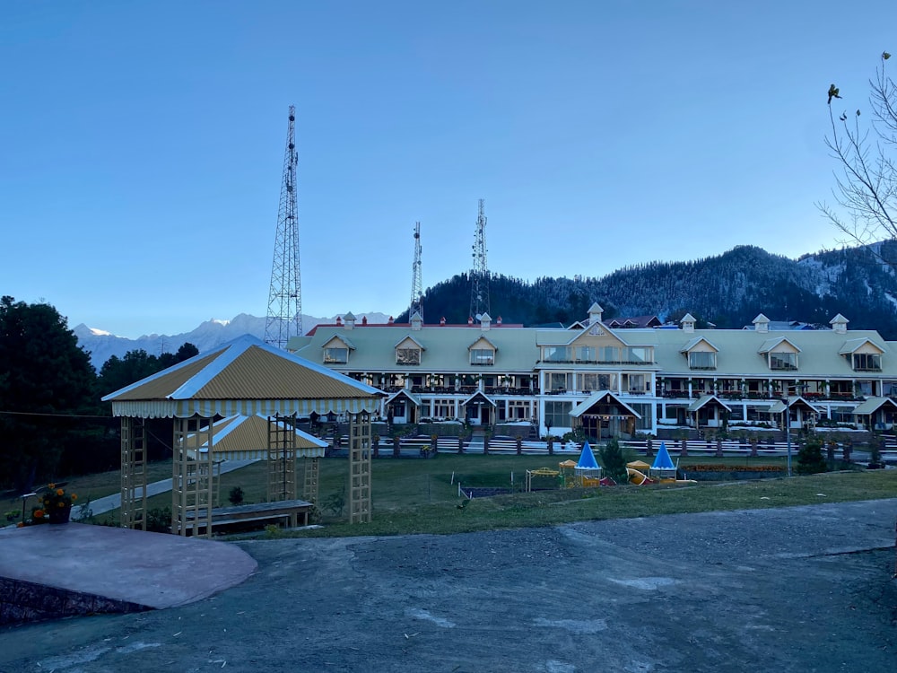 a large building with a lot of trees in front of it