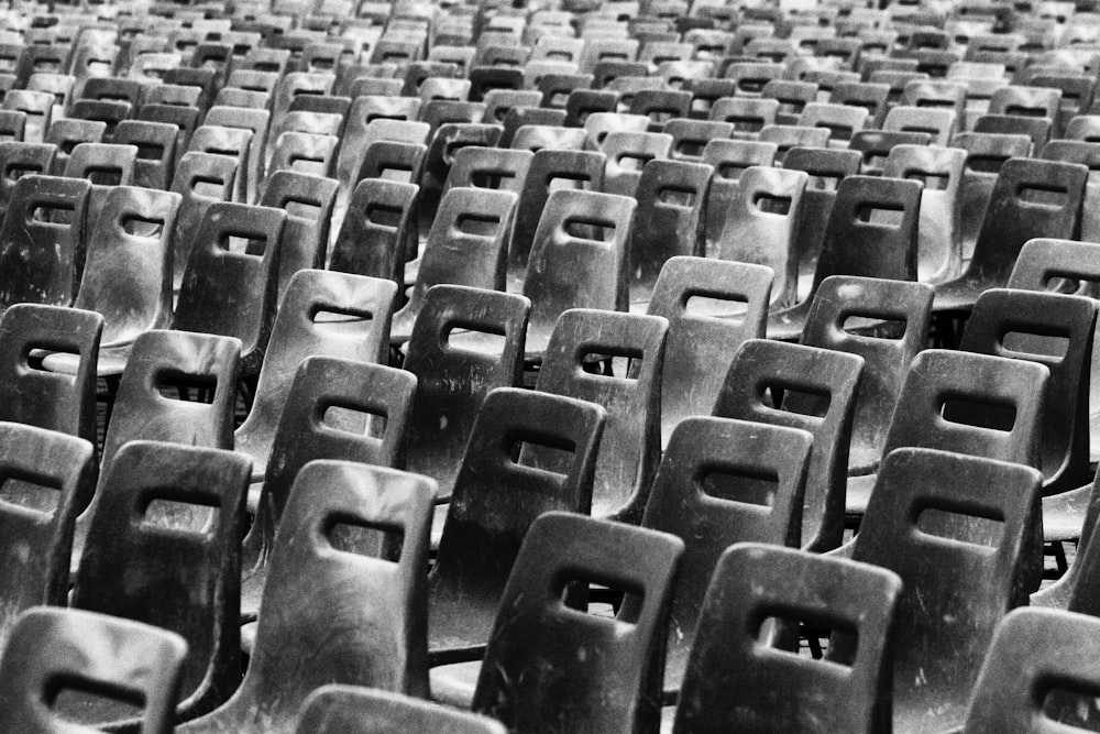 black and white photograph of rows of empty seats