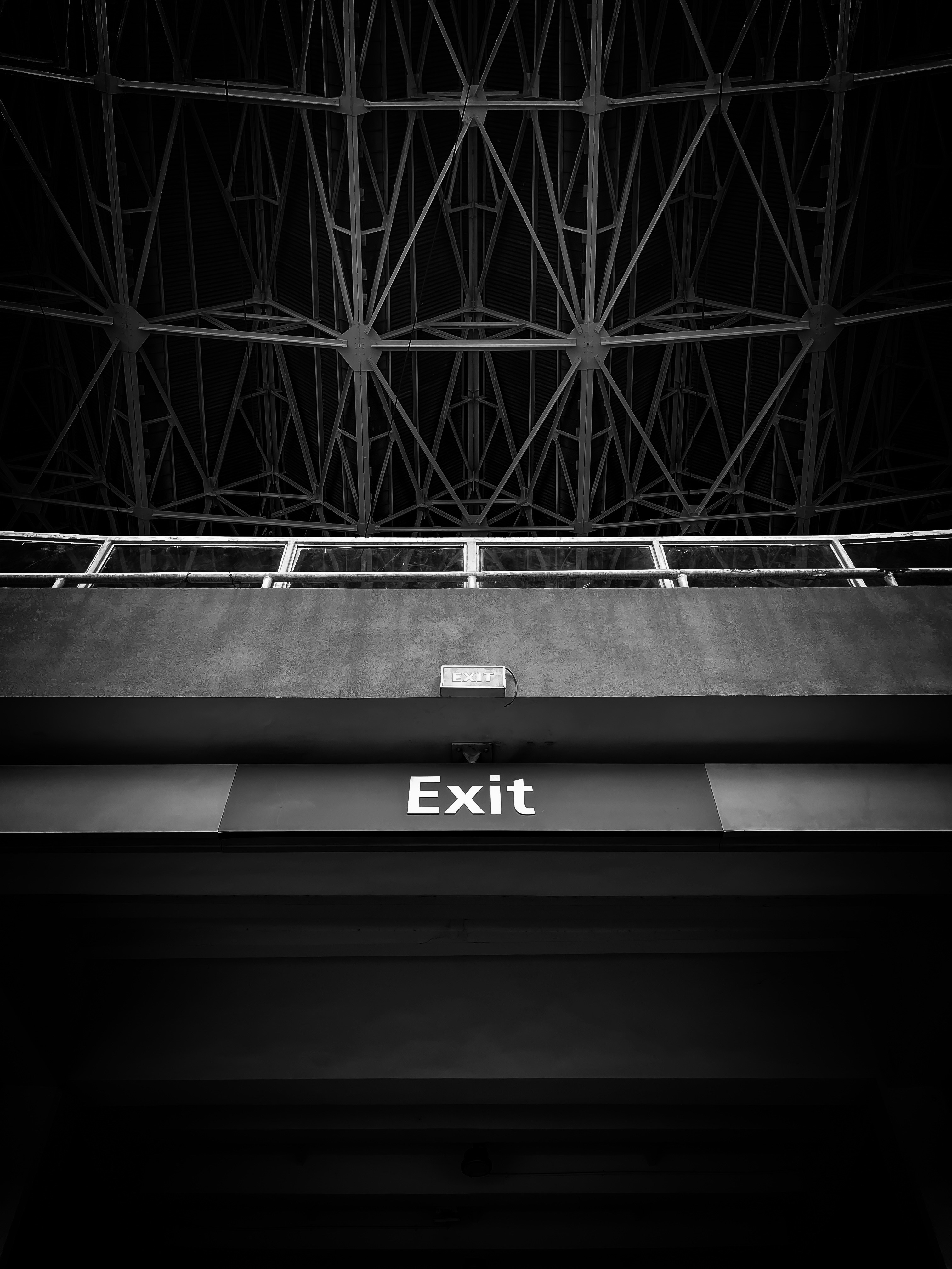an exit sign is shown in black and white