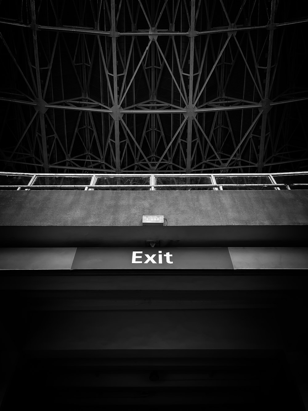 an exit sign is shown in black and white