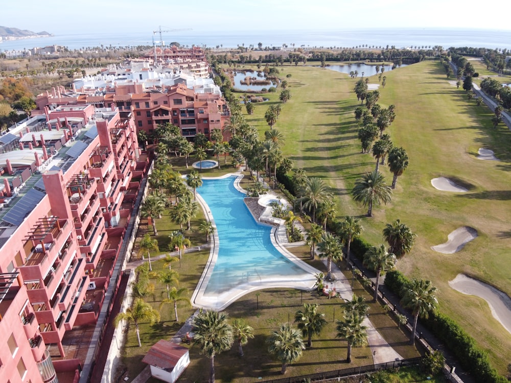 an aerial view of a golf course and a resort