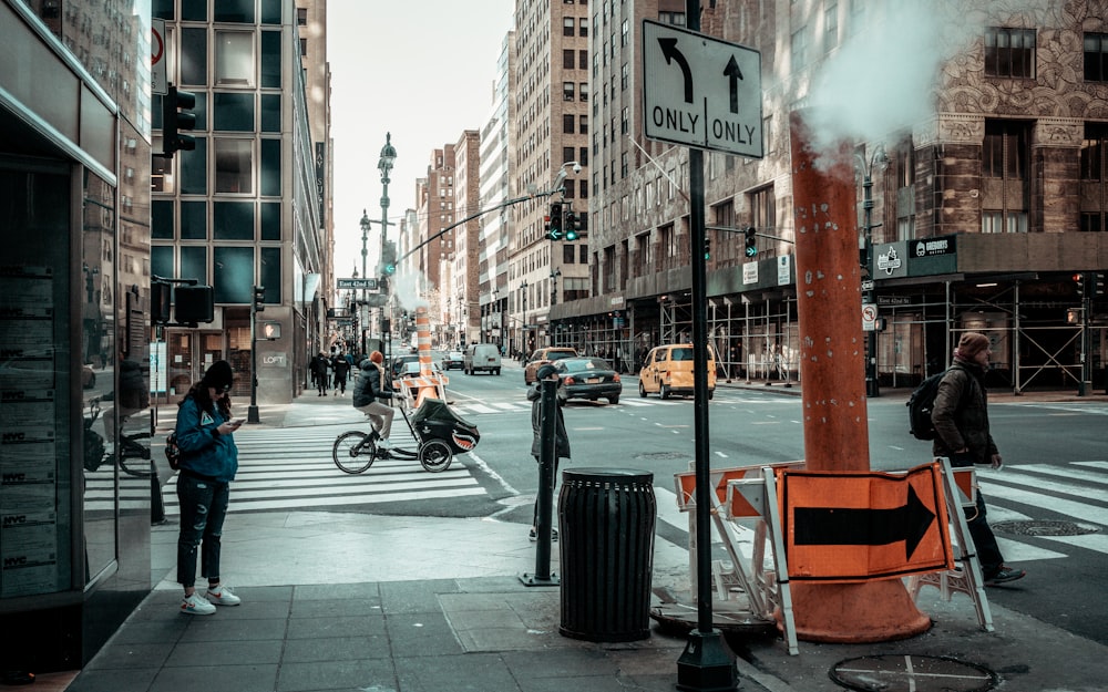 a person on a bike on a city street