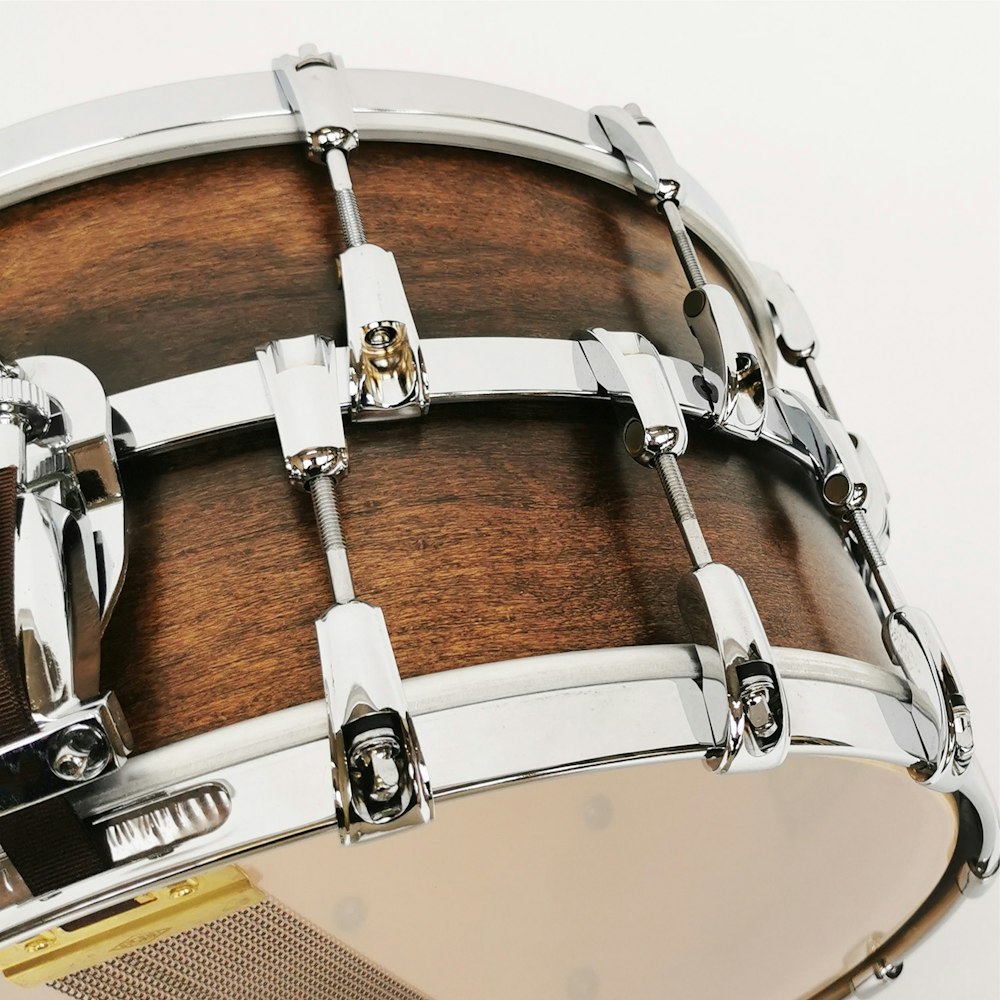 a close up of a drum on a white background