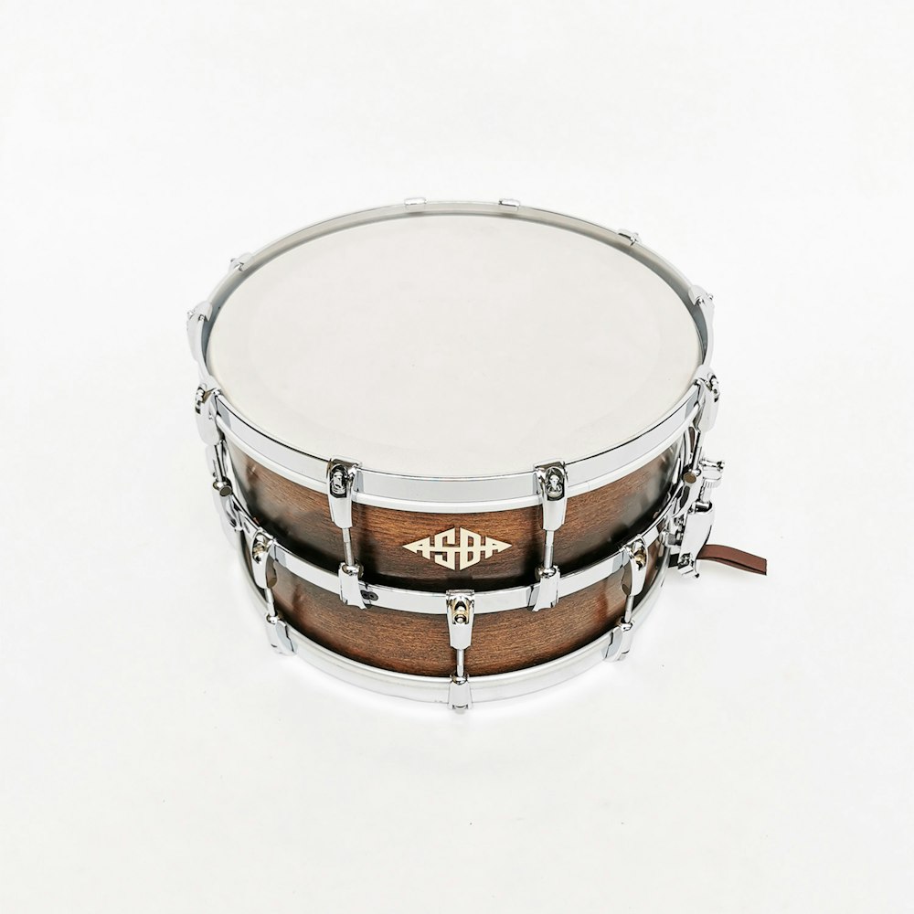 a close up of a drum on a white background