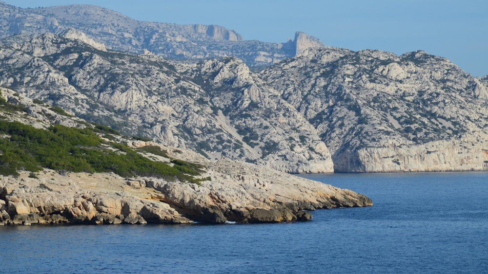 a large body of water surrounded by mountains