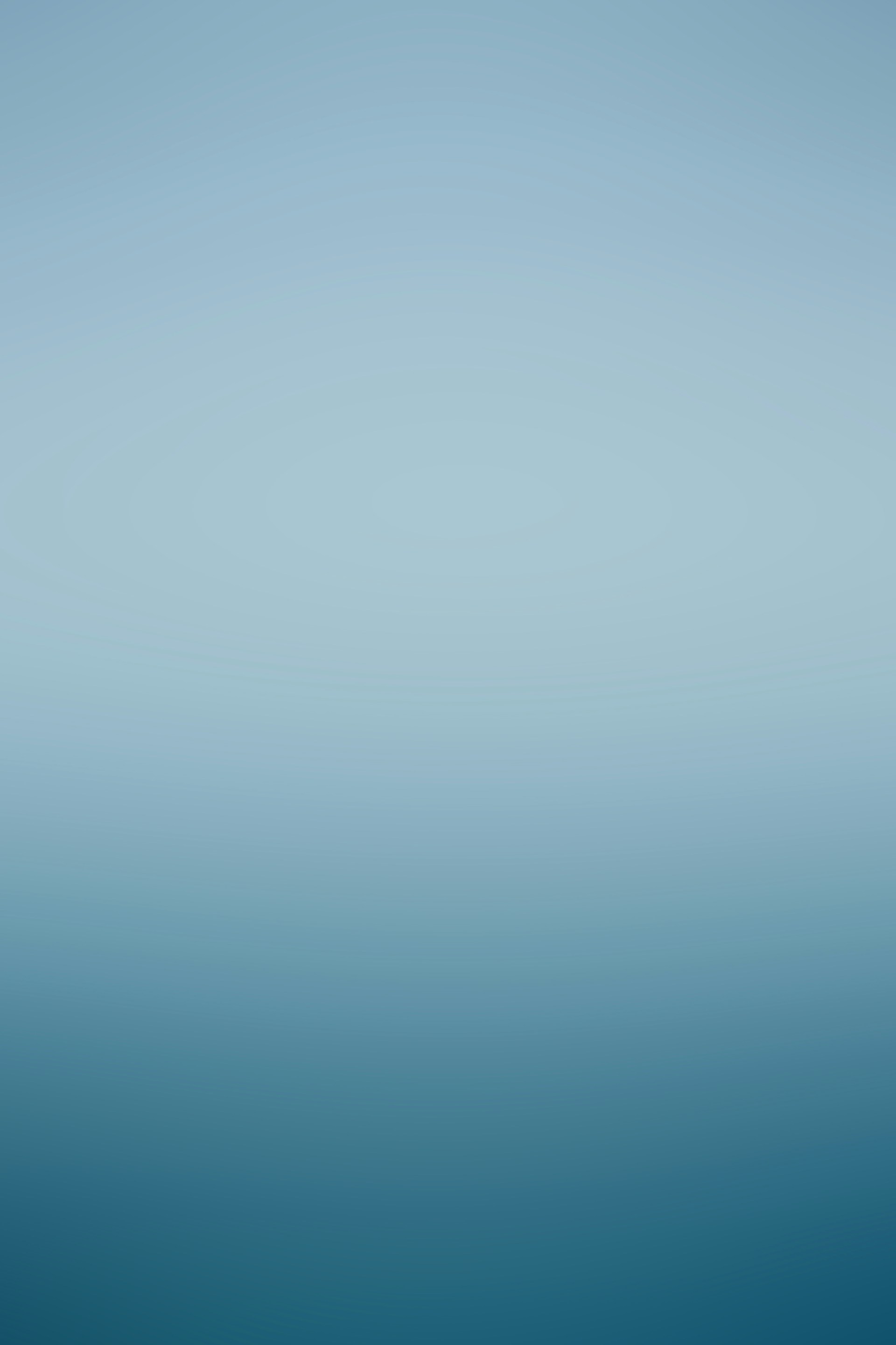 a blue and white background with a light blue sky