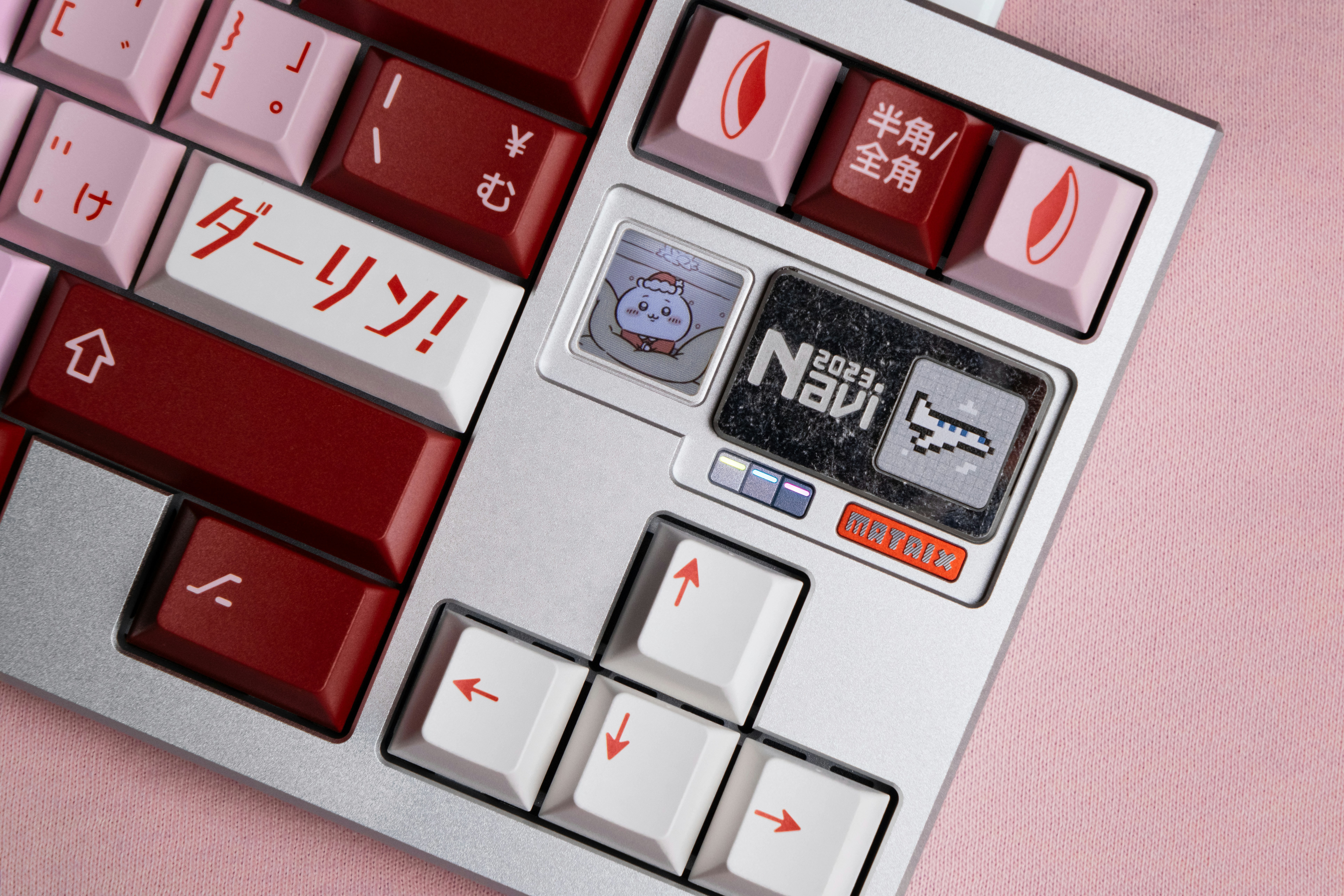 a close up of a red and silver keyboard