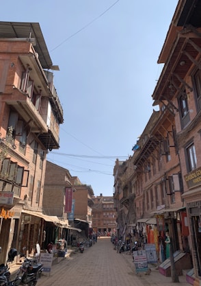 a street lined with lots of tall buildings